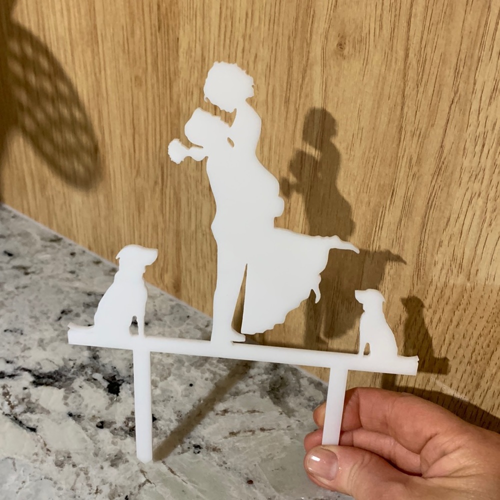 Cake topper/decoration piece couple with two dogs wedding cake